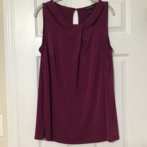 Dark pink sleeveless top with cut outs
